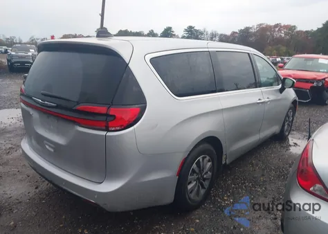 2023 Chrysler Pacifica Hybrid Touring L z USA, uszkodzony, nr VIN 2C4RC1L77PR588847